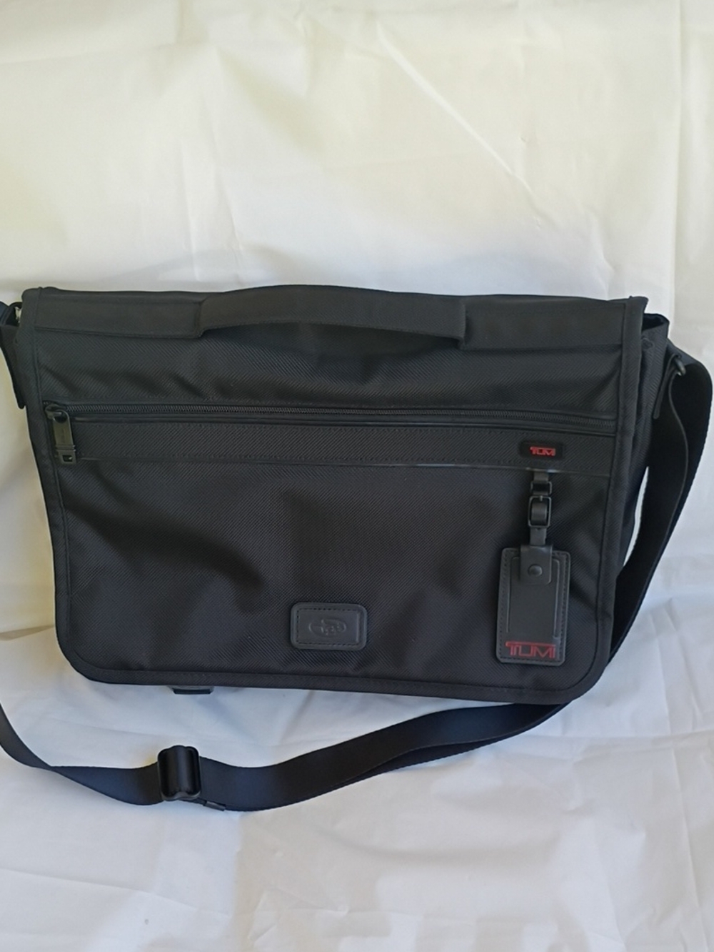Tumi Black Nylon Messenger with Red Logo Accent